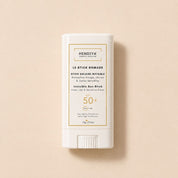 Le Stick Nomade SPF 50+ sunscreen stick by Hendiya, compact travel-friendly format