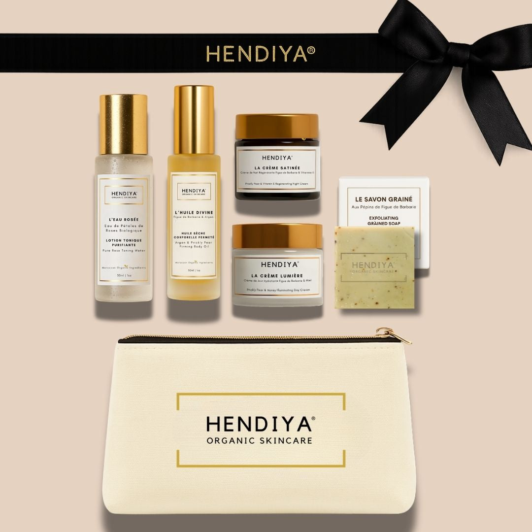 Les 5 produits de la Trousse Évasion Hendiya : Savon Grainé, Eau Rosée, Crème Lumière, Crème Satinée et Huile Divine